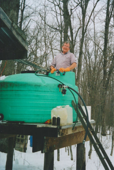 Cleaning the 1000 Gallon Sap Storage Tank