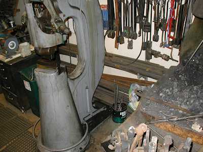 Longer Stock Behind Trip Hammer and Lathe