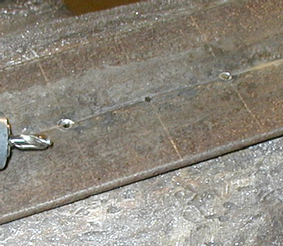 Chest rivet making fixture close up
