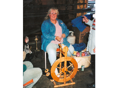 Sheri Spinning with her Louet S75