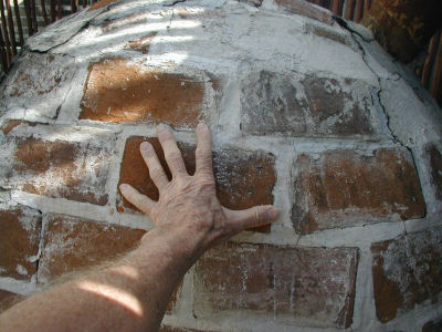Stone Oven Showing Size of Firebricks Relative to My Hand