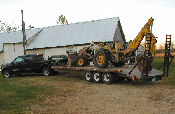 Bringing New Backhoe Home