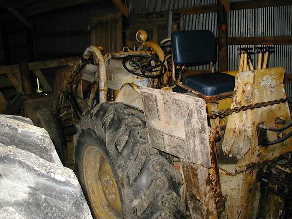 Ford 4000 Industrial Tractor with 713 Backhoe left rear
