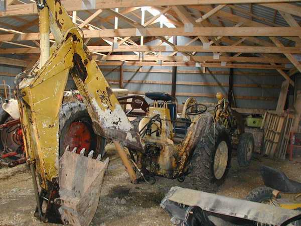 Ford 4000 Industrial tractor with 713 backhoe right rear